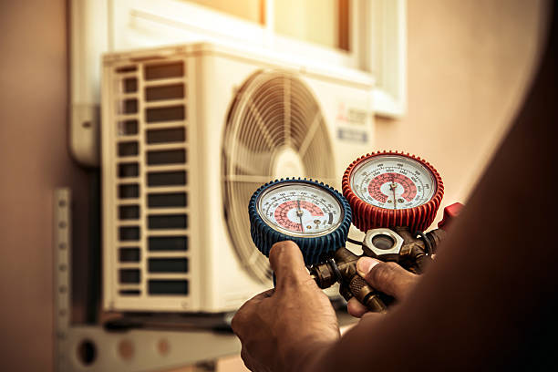 Professional Air Conditioning Service technician working in Stone Ridge, VA